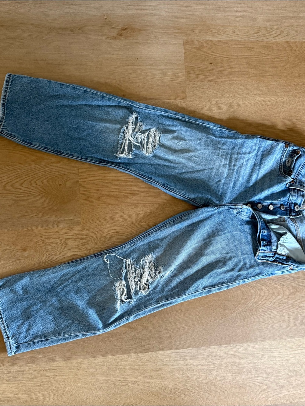 Women's Light Blue Distressed Ankle Crop Jeans